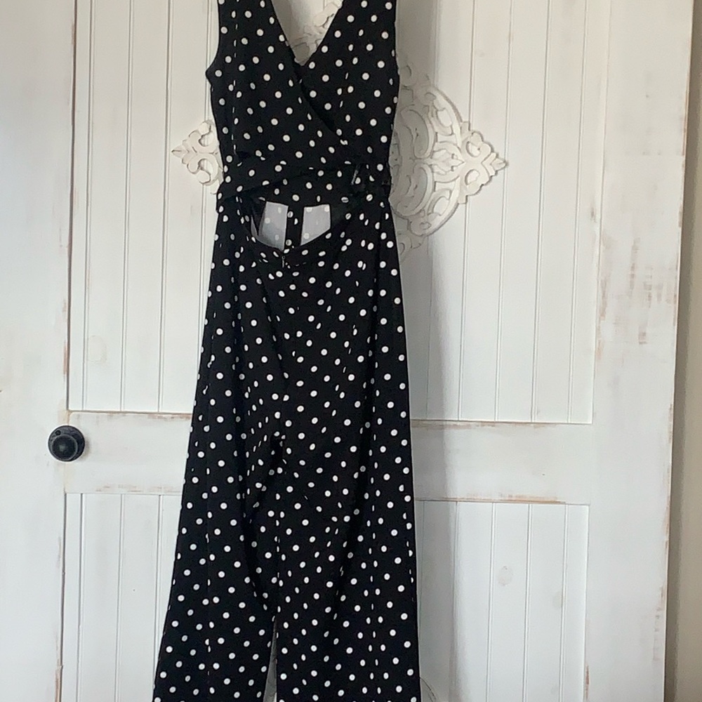 Black and white polka dotted jumpsuit romper